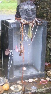 Beads, hair bands and icons left at ruined abbey